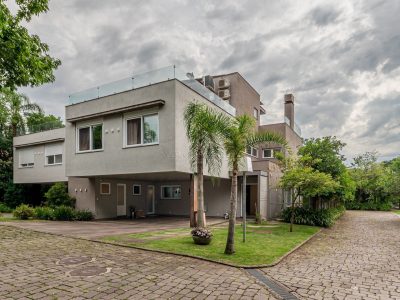 Casa em Condomínio à venda com 3 dormitórios, 513m² e 4 vagas no bairro Tristeza, Zona Sul de Porto Alegre