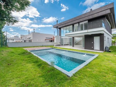 Casa em Condomínio à venda com 4 dormitórios, 292m² e 2 vagas no bairro Alphaville, Zona Sul de Porto Alegre