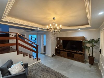 Casa em Condomínio à venda com 2 dormitórios, 117m² e 2 vagas no bairro Vila Nova, Zona Sul de Porto Alegre
