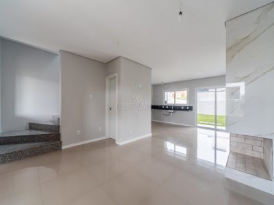 Casa à venda com 3 dormitórios, 115m² e 2 vagas no bairro Aberta dos Morros, Zona Sul de Porto Alegre