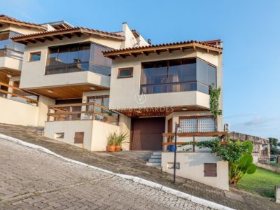 Casa em Condomínio à venda com 3 dormitórios, 181m² e 2 vagas no bairro Nonoai, Zona Sul de Porto Alegre