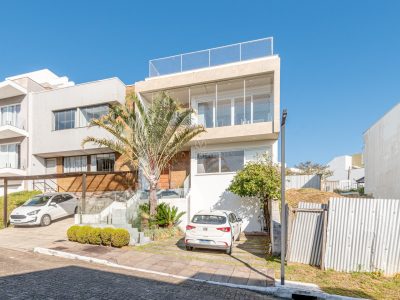 Casa em Condomínio à venda com 3 dormitórios, 180m² e 2 vagas no bairro Vila Nova, Zona Sul de Porto Alegre