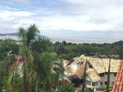 Casa em Condomínio à venda com 3 dormitórios, 210m² e 2 vagas no bairro Jardim Isabel, Zona Sul de Porto Alegre