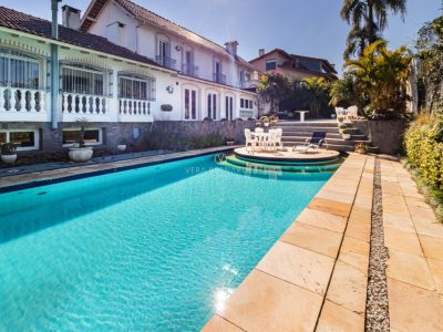 Casa à venda com 4 dormitórios, 650m² e 4 vagas no bairro Ipanema, Zona Sul de Porto Alegre