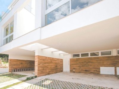 Casa em Condomínio à venda com 3 dormitórios, 211m² e 4 vagas no bairro Jardim Isabel, Zona Sul de Porto Alegre