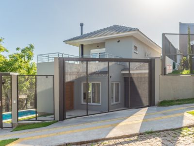 Casa à venda com 3 dormitórios, 210m² e 2 vagas no bairro Jardim Isabel, Zona Sul de Porto Alegre