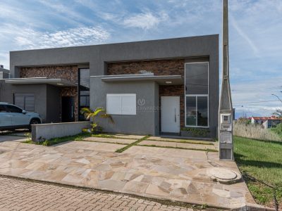 Casa em Condomínio à venda com 3 dormitórios, 88m² e 2 vagas no bairro Hípica, Zona Sul de Porto Alegre