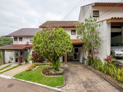 Casa em Condomínio à venda com 3 dormitórios, 160m² e 2 vagas no bairro Cavalhada, Zona Sul de Porto Alegre