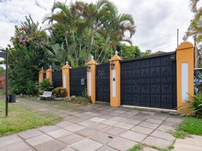 Casa à venda com 3 dormitórios, 280m² e 2 vagas no bairro Vila Assunção, Zona Sul de Porto Alegre