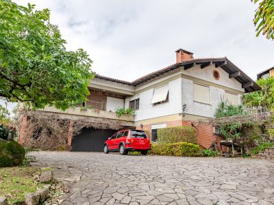 Casa à venda com 4 dormitórios, 430m² e 6 vagas no bairro Sétimo Céu, Zona Sul de Porto Alegre