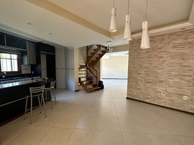 Casa em Condomínio à venda com 3 dormitórios, 131m² e 2 vagas no bairro Imperial Park, Zona Sul de Porto Alegre
