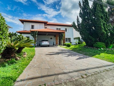 Casa em Condomínio à venda com 3 dormitórios, 348m² e 2 vagas no bairro Terra Ville, Zona Sul de Porto Alegre