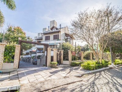 Casa em Condomínio à venda com 4 dormitórios, 317m² e 4 vagas no bairro Tristeza, Zona Sul de Porto Alegre