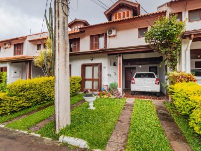 Casa em Condomínio à venda com 3 dormitórios, 160m² e 3 vagas no bairro Cavalhada, Zona Sul de Porto Alegre