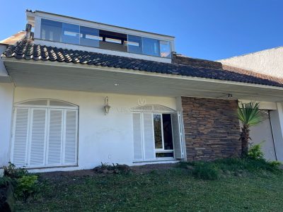 Casa à venda com 3 dormitórios, 254m² e 3 vagas no bairro Cristal em Porto Alegre