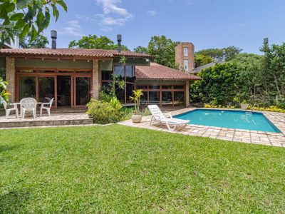 Casa em Condomínio à venda com 4 dormitórios, 650m² e 3 vagas no bairro Jardim do Sol, Zona Sul de Porto Alegre