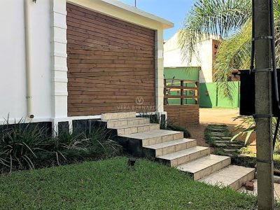 Casa Térrea à venda com 3 dormitórios, 95m² e 3 vagas no bairro Vila Assunção, Zona Sul de Porto Alegre