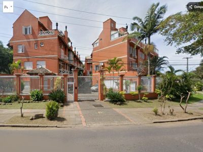 Casa em Condomínio à venda com 3 dormitórios, 252m² e 3 vagas no bairro Vila Assunção, Zona Sul de Porto Alegre