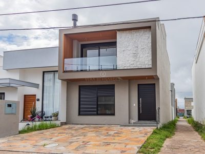 Casa em Condomínio à venda com 3 dormitórios, 172m² e 2 vagas no bairro Hípica, Zona Sul de Porto Alegre