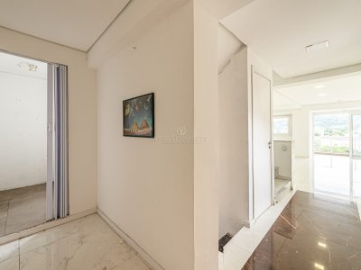 Casa à venda com 4 dormitórios, 378m² e 3 vagas no bairro Teresópolis, Zona Sul de Porto Alegre