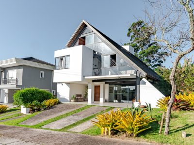 Casa em Condomínio à venda com 4 dormitórios, 395m² e 4 vagas no bairro Alphaville, Zona Sul de Porto Alegre