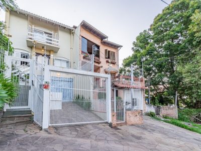 Casa à venda com 3 dormitórios, 215m² e 3 vagas no bairro Santa Tereza, Zona Sul de Porto Alegre