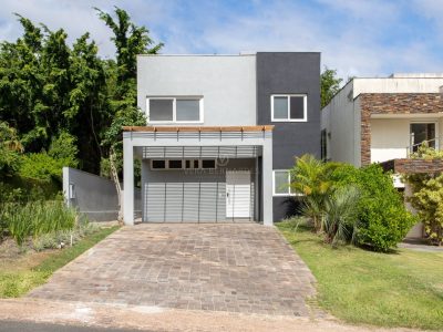 Casa em Condomínio à venda com 4 dormitórios, 500m² e 2 vagas no bairro Terra Ville, Zona Sul de Porto Alegre