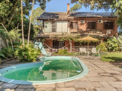 Casa à venda com 5 dormitórios, 345m² e 8 vagas no bairro Ipanema, Zona Sul de Porto Alegre