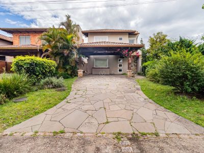 Casa em Condomínio à venda com 3 dormitórios, 240m² e 4 vagas no bairro Terra Ville, Zona Sul de Porto Alegre