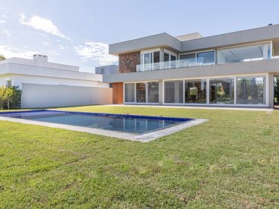 Casa em Condomínio à venda com 3 dormitórios, 380m² e 4 vagas no bairro Terra Ville, Zona Sul de Porto Alegre