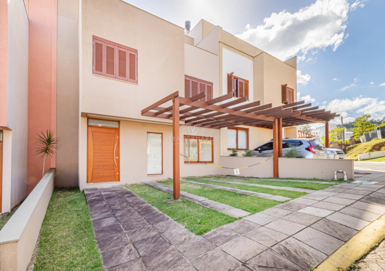 Casa em Condomínio à venda com 3 dormitórios, 240m² e 2 vagas no bairro Vila Nova, Zona Sul de Porto Alegre