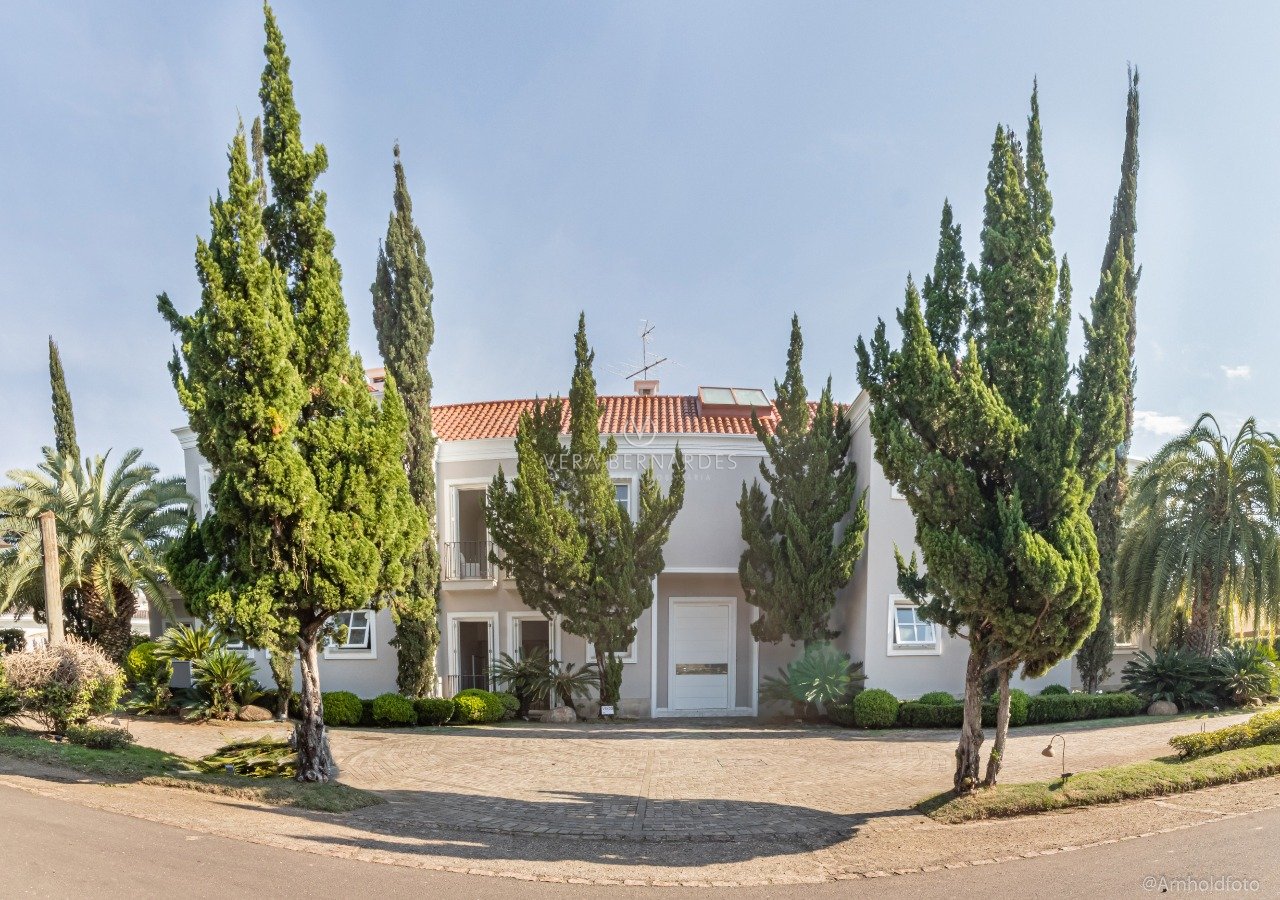 Casa em Condomínio à venda com 4 dormitórios, 750m² e 4 vagas no bairro Terra Ville, Zona Sul de Porto Alegre