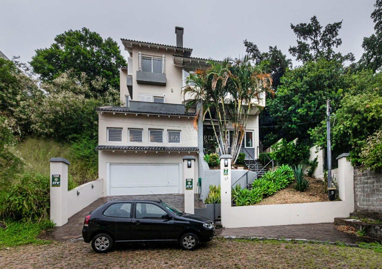 Casa em Condomínio à venda com 4 dormitórios, 322m² e 2 vagas no bairro Nonoai, Zona Sul de Porto Alegre