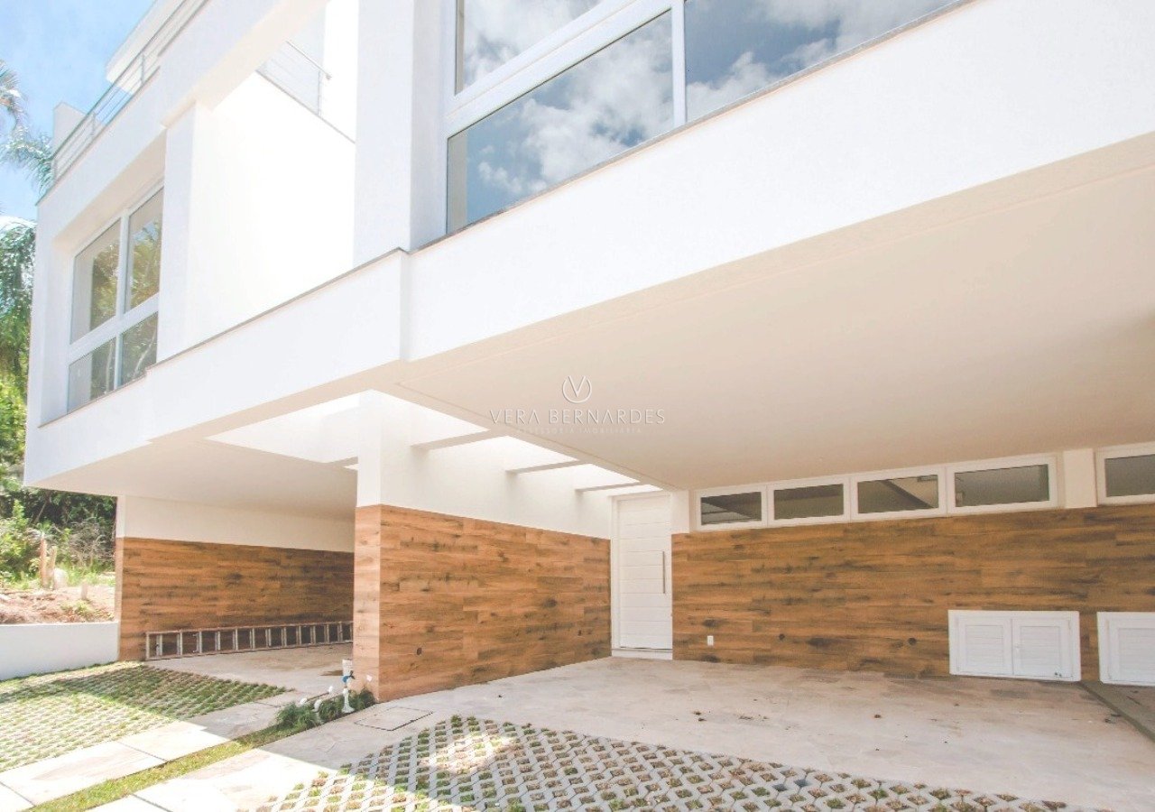 Casa em Condomínio à venda com 3 dormitórios, 211m² e 4 vagas no bairro Jardim Isabel, Zona Sul de Porto Alegre