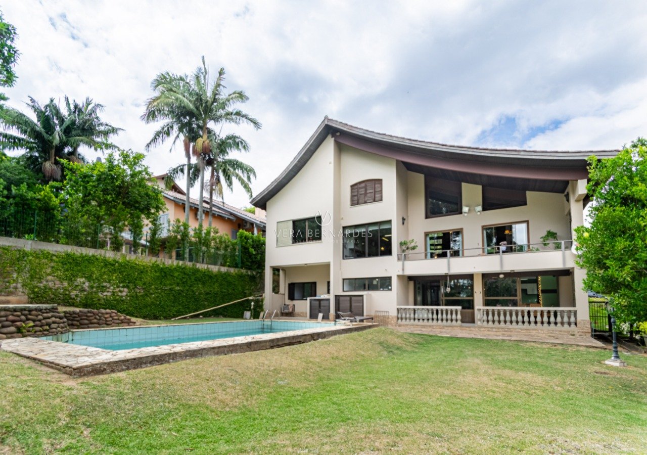 Casa em Condomínio à venda com 5 dormitórios, 565m² e 4 vagas no bairro Jardim do Sol, Zona Sul de Porto Alegre
