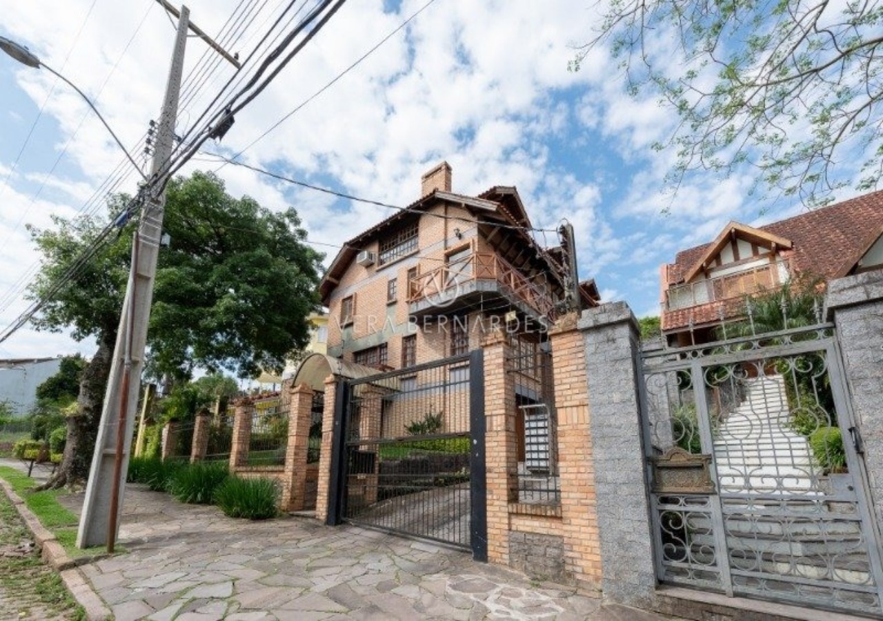 Casa em Condomínio à venda com 3 dormitórios, 278m² e 3 vagas no bairro Jardim Isabel, Zona Sul de Porto Alegre